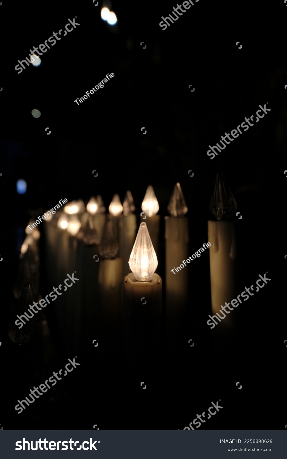 votive electronic electric candles in catholic church. High quality photo #2258898629