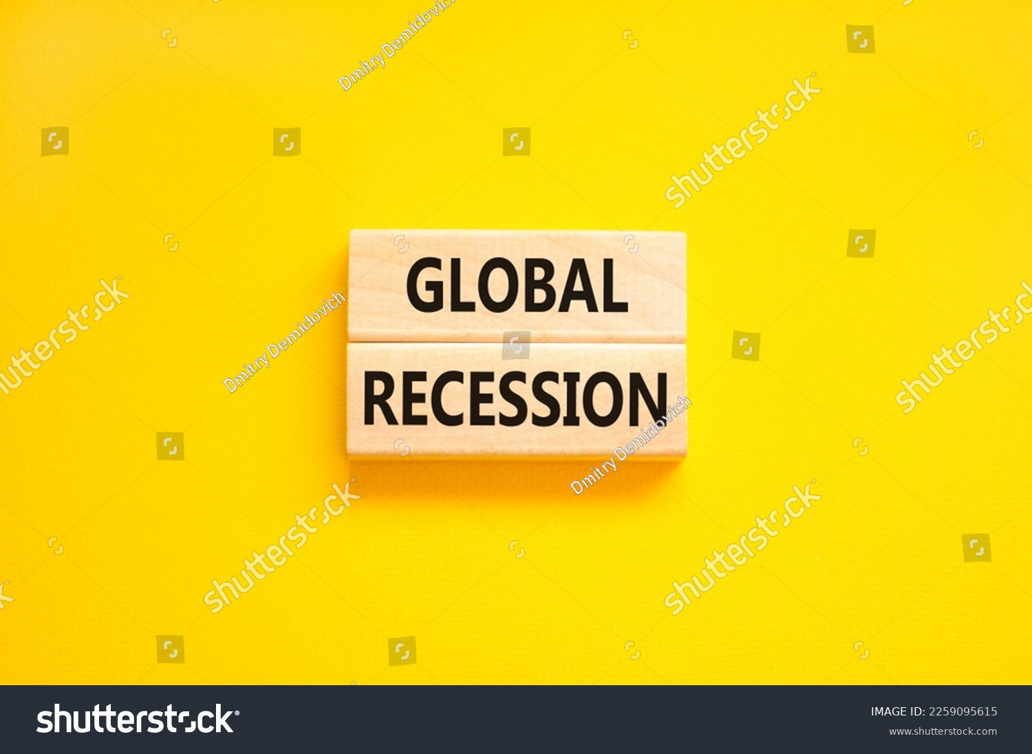 Global recession symbol. Concept words Global recession on wooden blocks. Beautiful yellow table yellow background. Business and global recession concept. Copy space. #2259095615