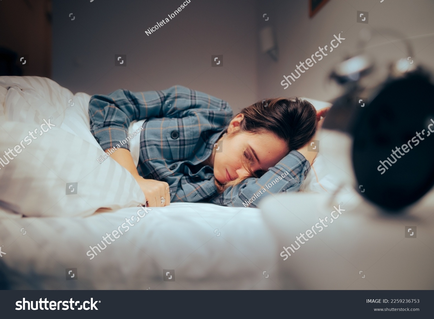 
Woman Sleeping Having Nightmares Feeling Concerned and Stressed. Person suffering with sleep hygiene due to post traumatic stress disorder
 #2259236753