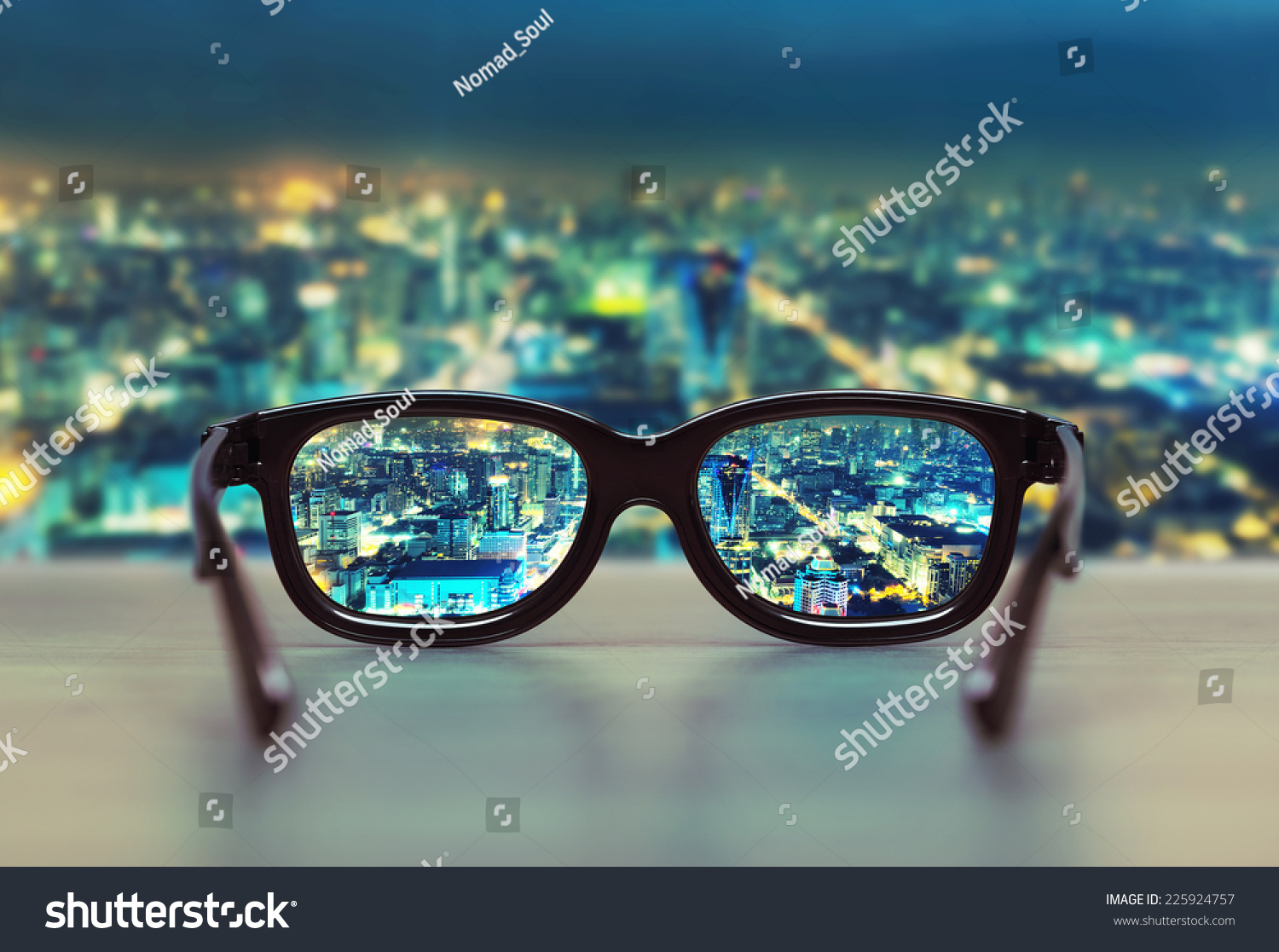 Night cityscape focused in glasses lenses #225924757