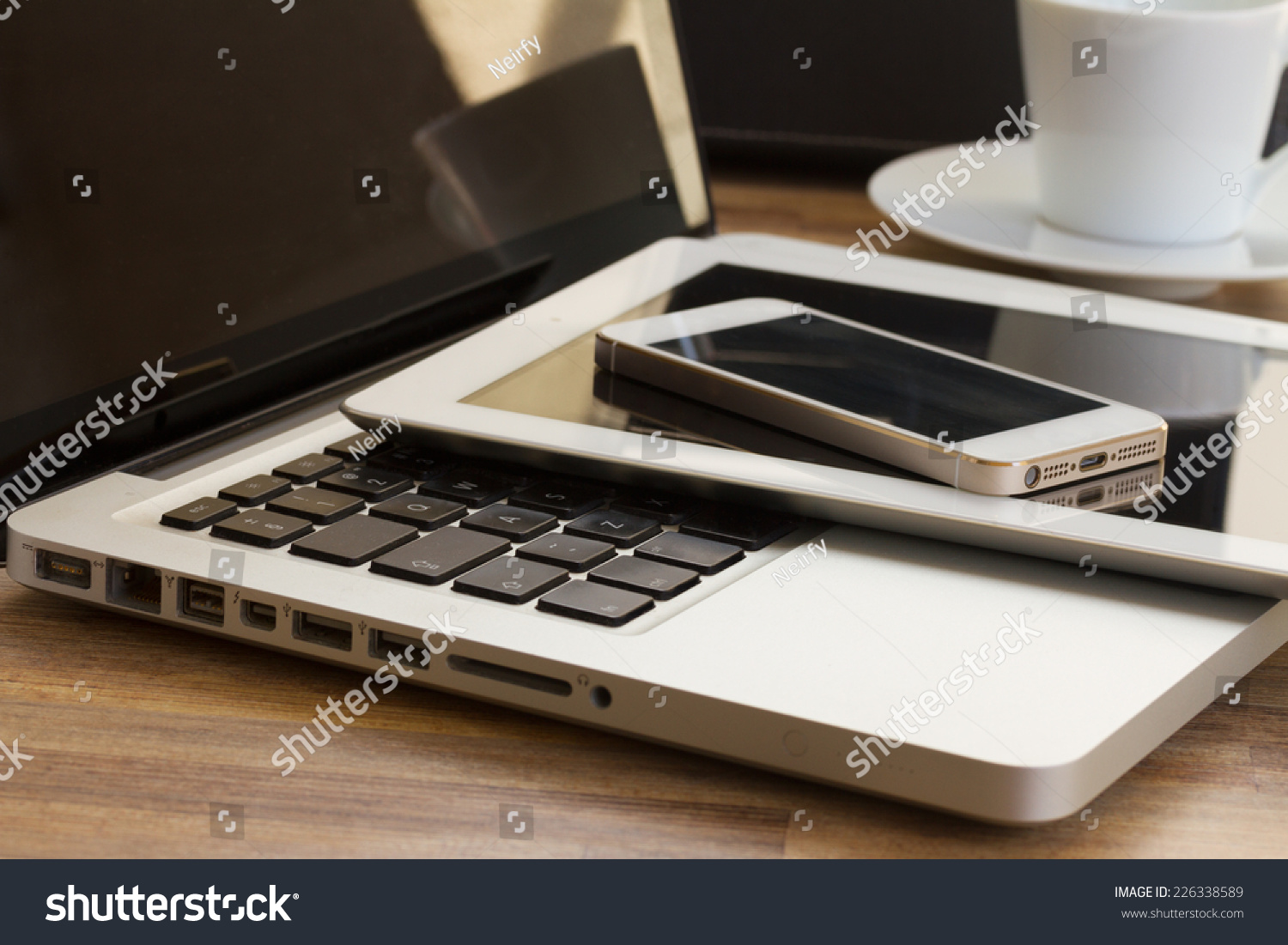 modern computer gadgets  - laptop, tablet and phone close up #226338589