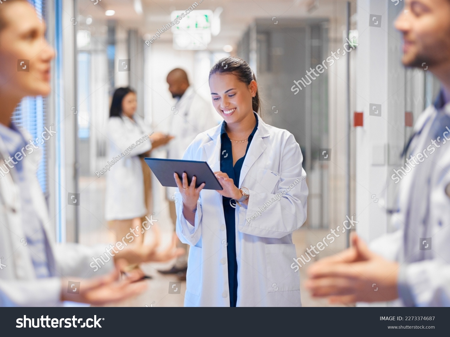 Happy woman doctor on tablet for employees management, hospital workflow and clinic staff solution on software or app. Healthcare manager on digital tech for medical team research or problem solving #2273374687