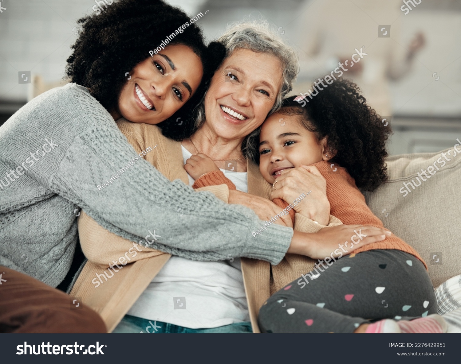 Happy, hug and portrait of family with affection, visit and bonding on mothers day. Smile, interracial and mother, child and grandmother hugging, being affectionate and cheerful for quality time #2276429951