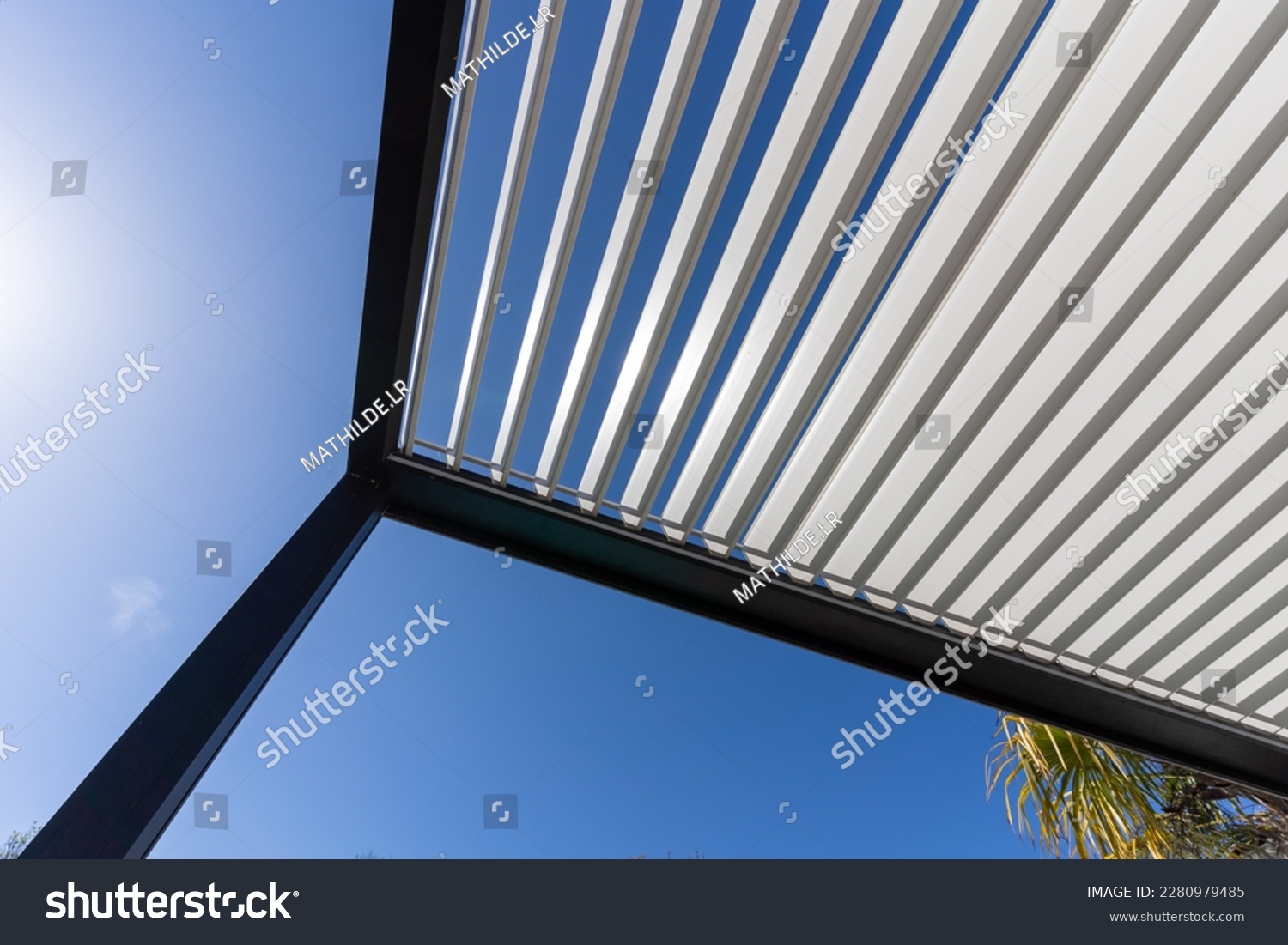 Aluminum pergola for outdoor patio against clear blue sky. Bottom view #2280979485