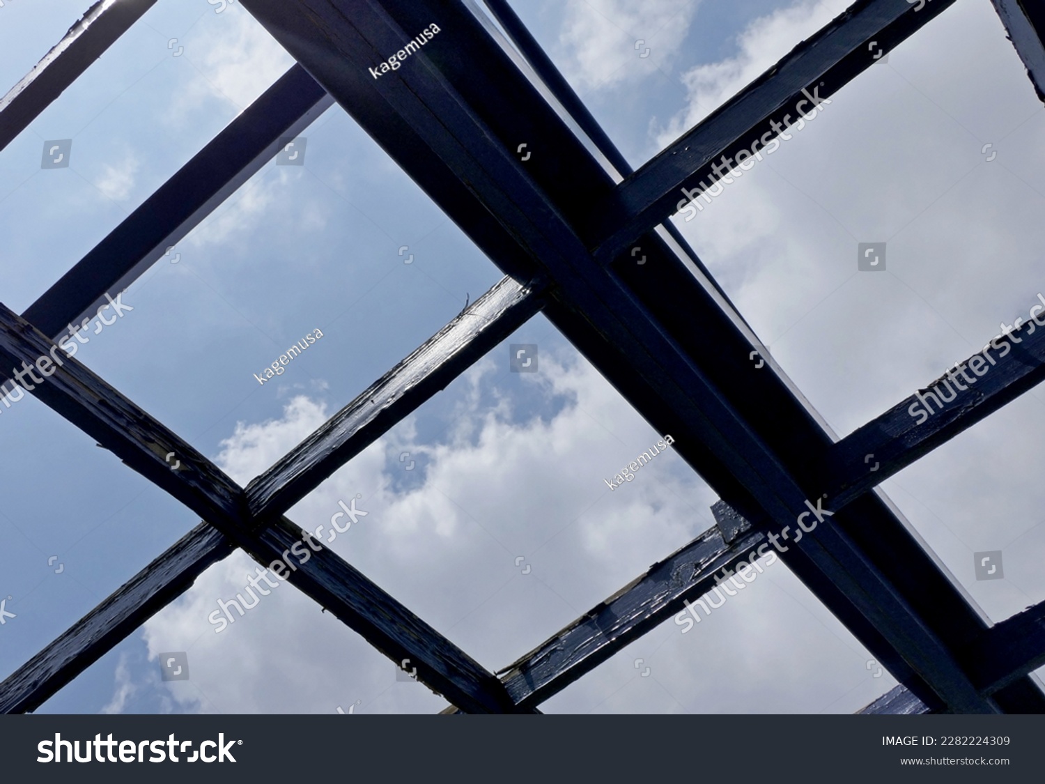 industrial background with a building's blue wooden lines #2282224309