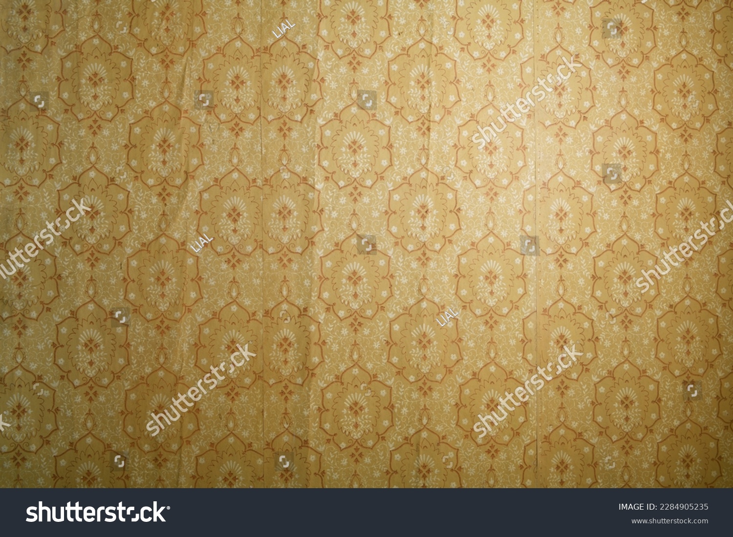 Old wallpaper on the wall. Old wallpaper for texture or background. #2284905235