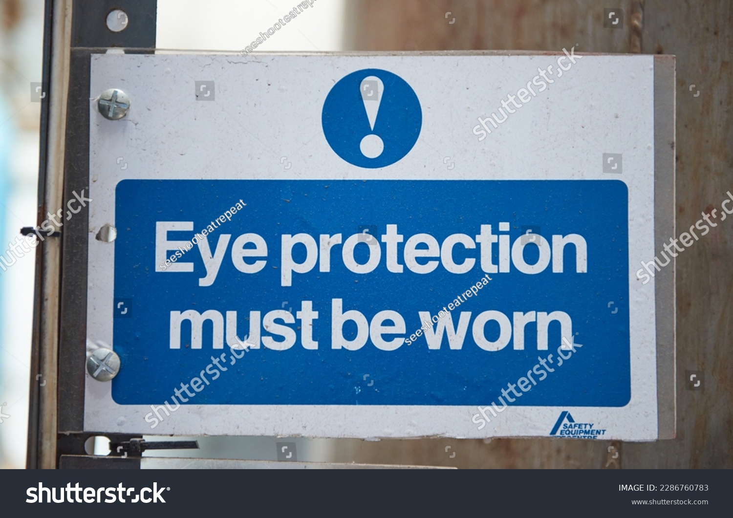 Eye protection must be worn health and safety sign to deny personal with no access clearance. Off limits in an industrial factory. danger ahead, health and safety hazard warning. #2286760783