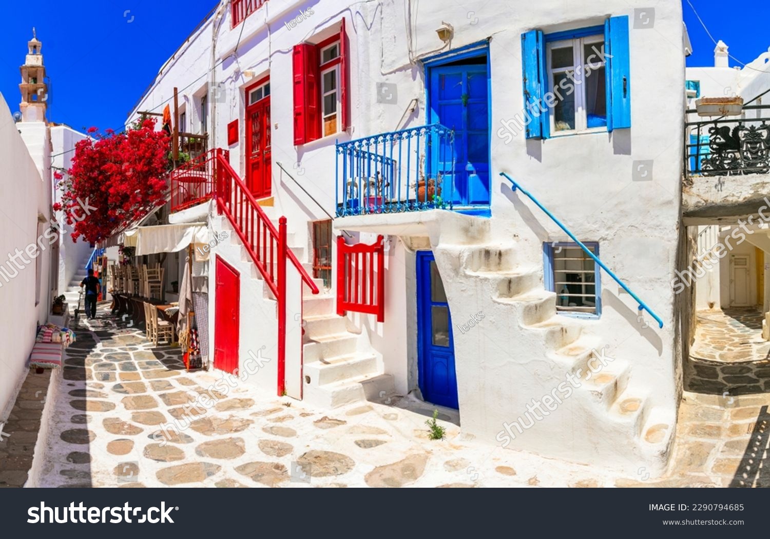 Authentic traditional Greece. Mykonos island. Charming colorful floral streets of old Chora village.  Cyclades #2290794685