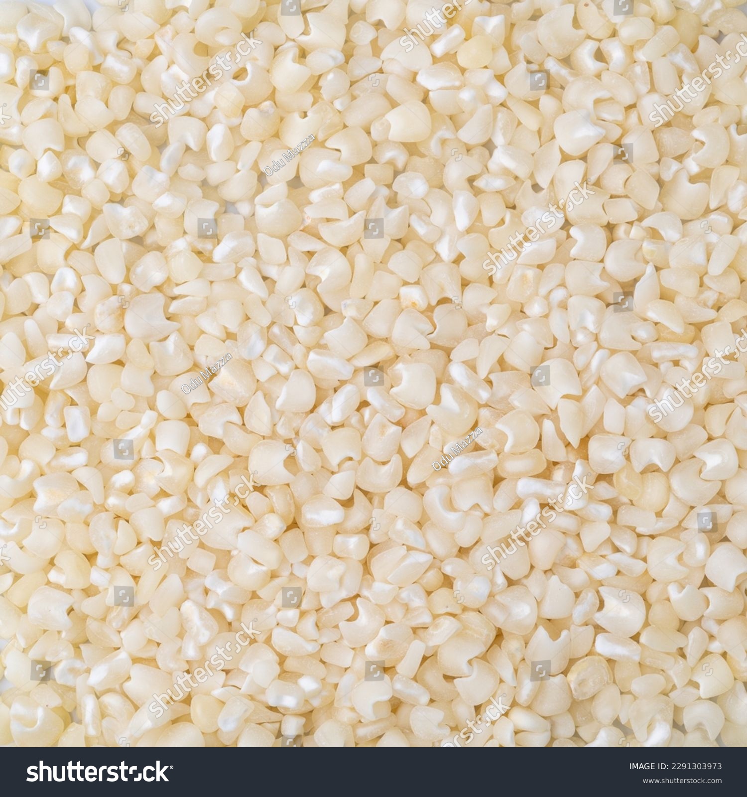 Closeup, top view of dried white corn or canjica. Food backdrop. #2291303973