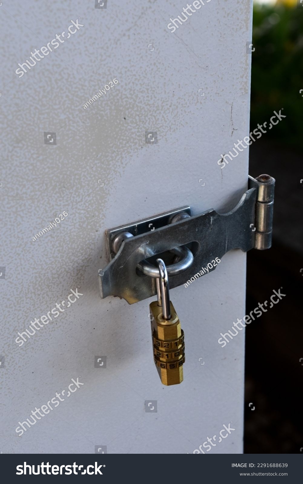 A padlock attached to a door or fence, photo taken in a town called montreux, april 19, 2023, switzerland. #2291688639
