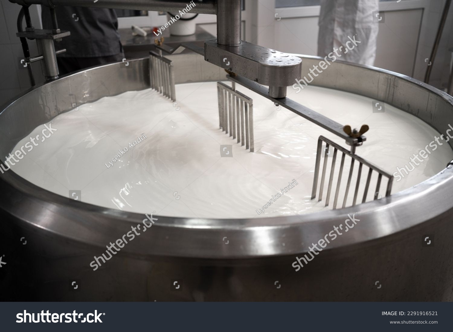 Process of making dairy products in modern dairy factory. Preparing milk for cheese, pasteurization in large tanks. Copy space #2291916521