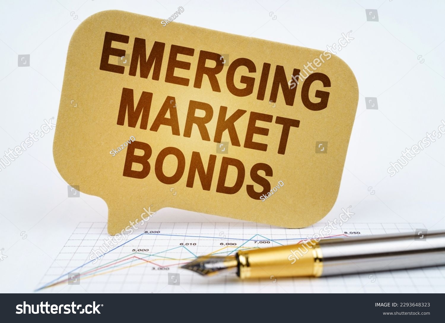 Business concept. On the business diagram is a pen and a sign with the inscription - emerging market bonds #2293648323