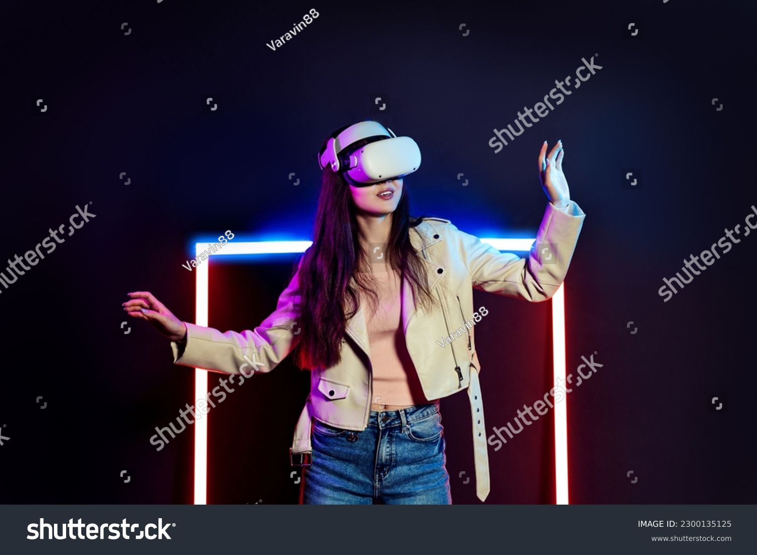 Exploring virtual reality world. Woman in vr headset goggles considers 3d space. #2300135125