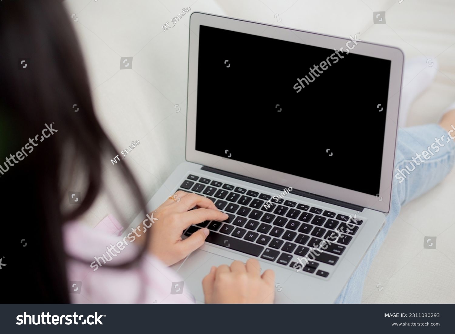 Young asian woman work from home with laptop computer blank screen mockup, freelance is female using notebook with display empty, girl typing keyboard, business and communication concept. #2311080293