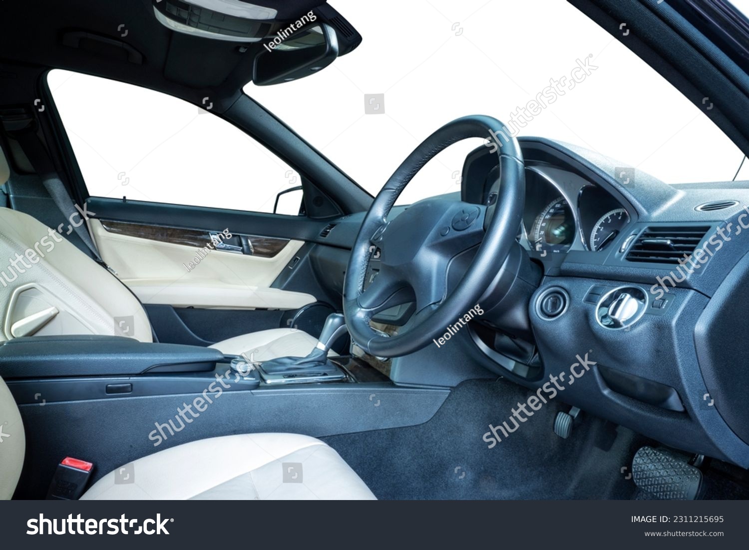 Steering wheel, shift lever, dashboard, speedometer display. Modern car interior #2311215695
