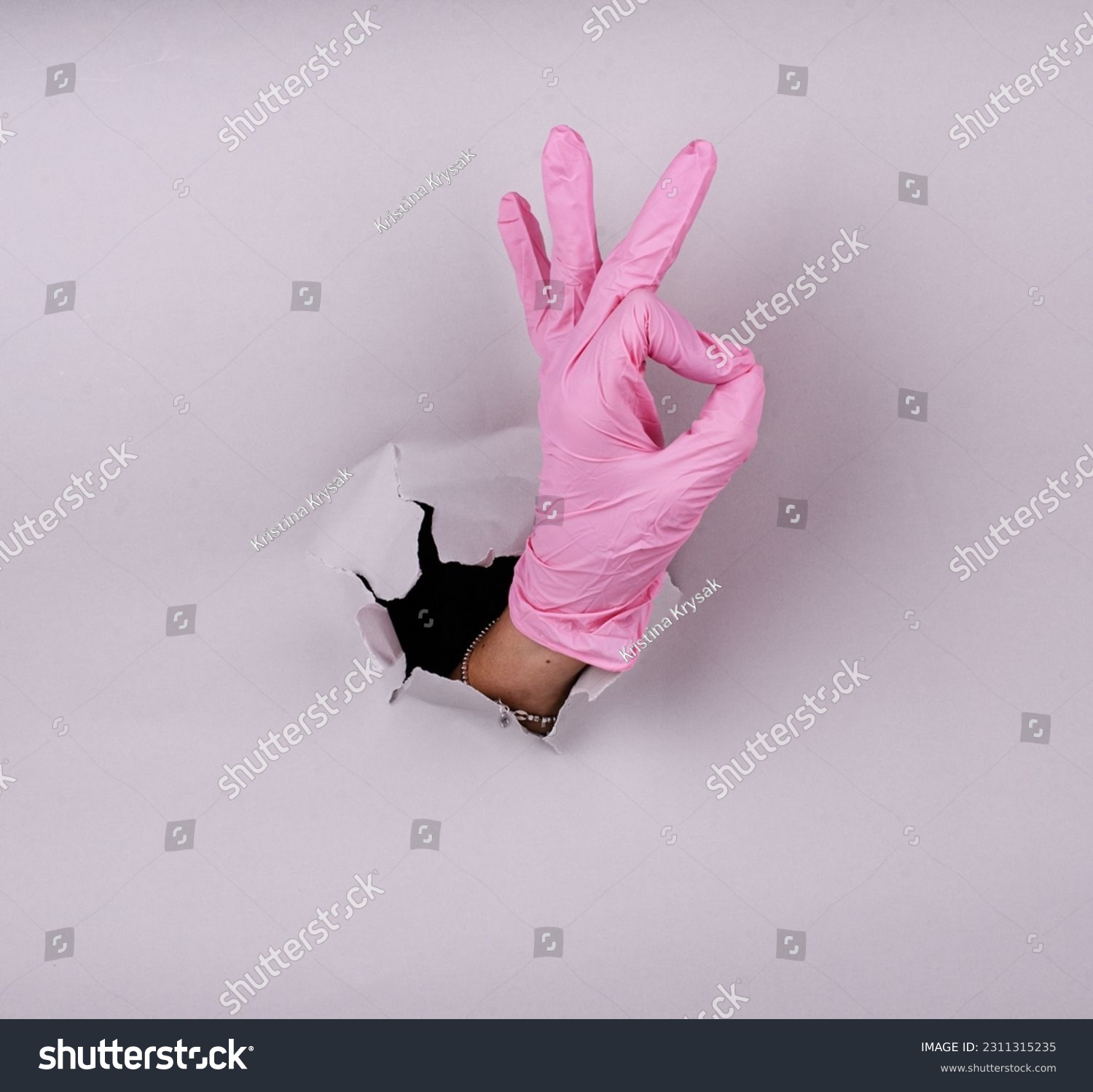 Disposable colored latex gloves. Hand in gloves. Medicine. Sterility. #2311315235