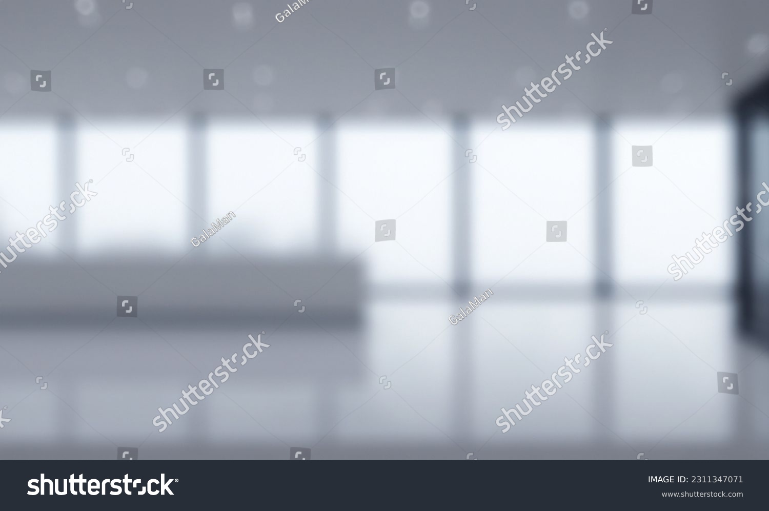 Blurred empty open space office. Abstract light bokeh at office interior background for design and table #2311347071