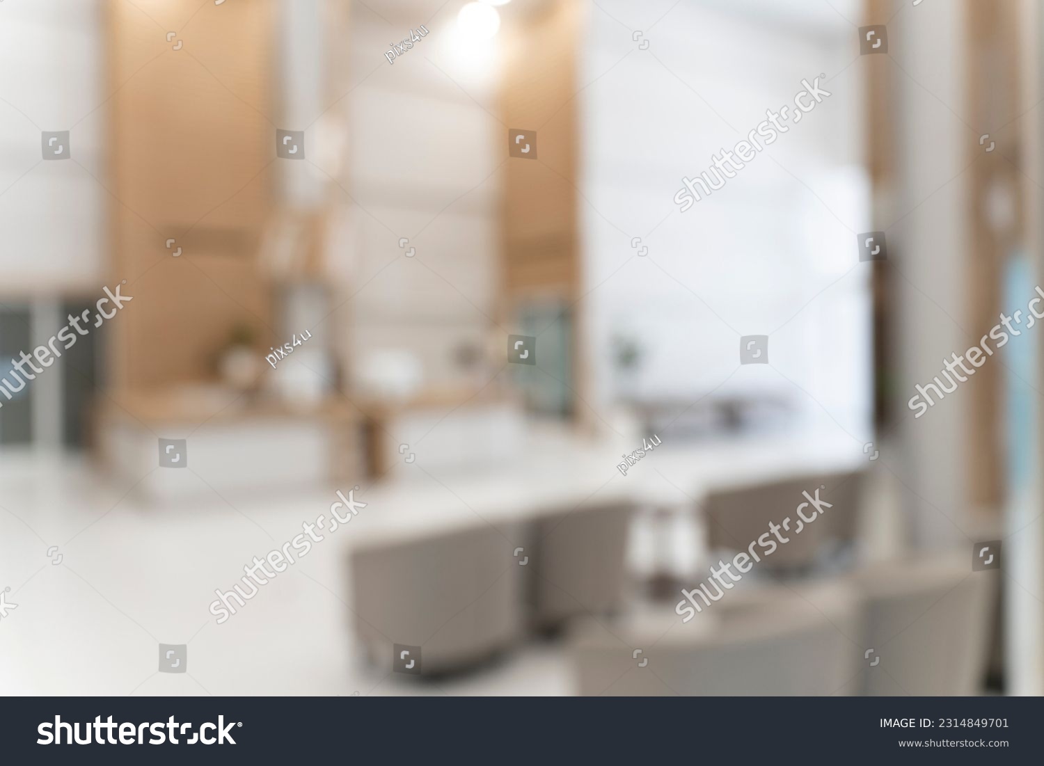 Blurred image background of corridor in hospital or clinic, counter information and sofa in waiting area near front of the examination room, nobody in image #2314849701