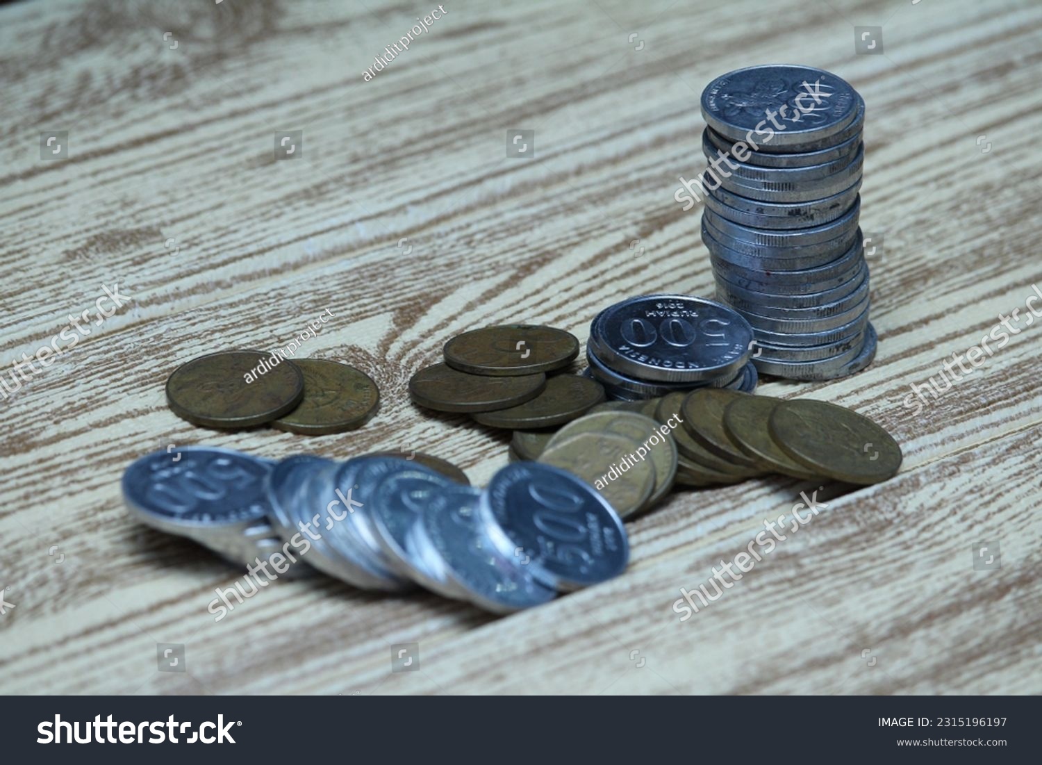 Pile of coins on the table. Financial and business concept. #2315196197