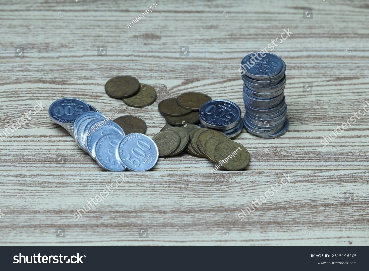 Pile of coins on the table. Financial and business concept. #2315196205