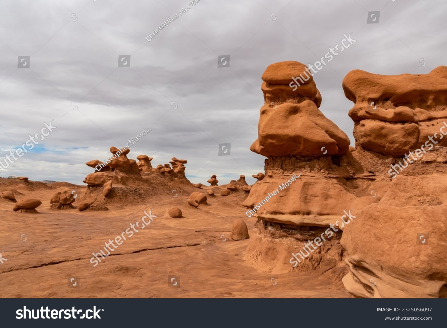 Close up view on unique eroded Hoodoo Rock Formations at Goblin Valley State Park in Utah, USA, America. Sandstone rocks called goblins which are mushroom-shaped rock pinnacles. Overcast day in summer #2325056097