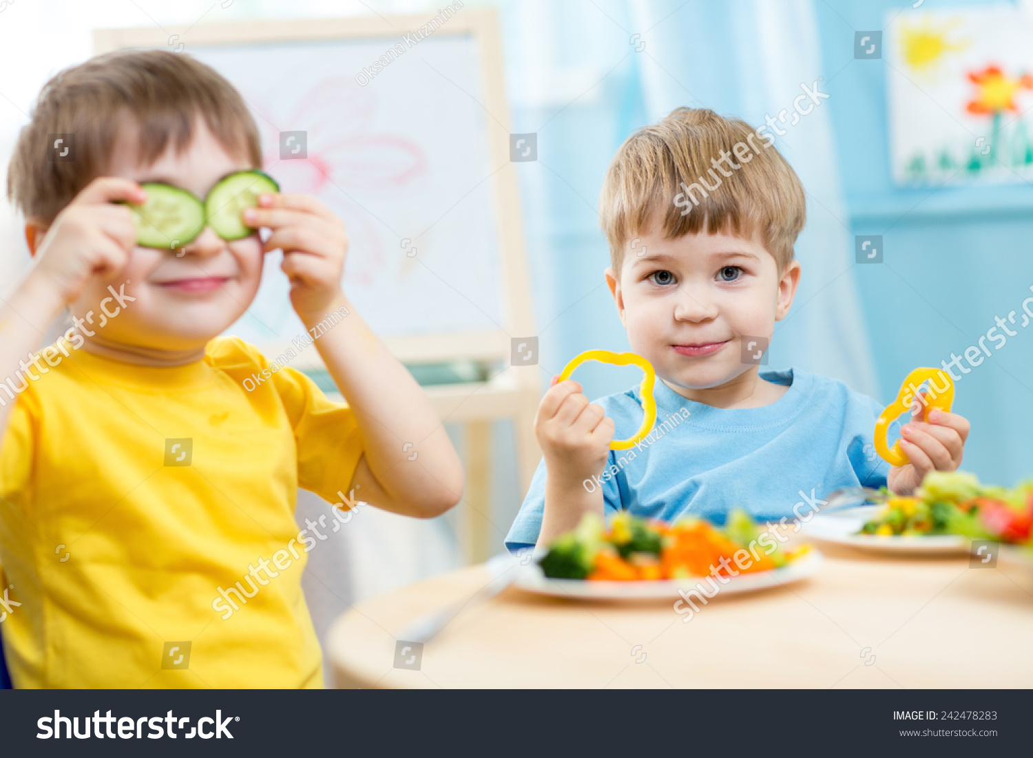 kids eating healthy food in kindergarten or at home #242478283