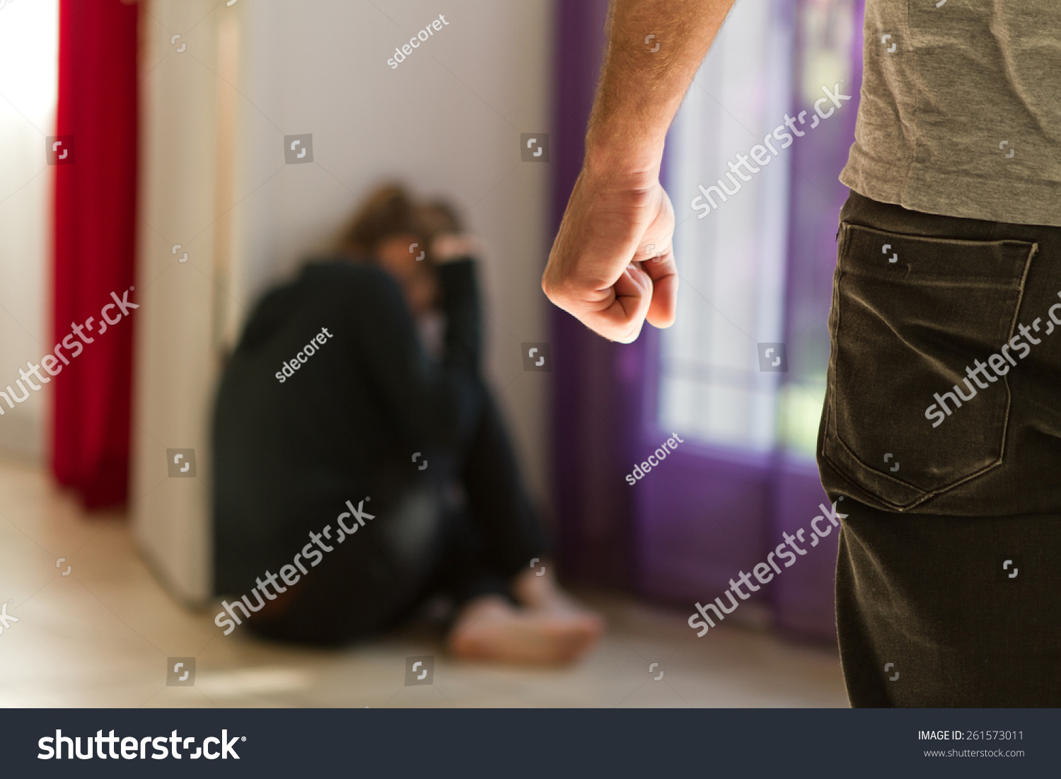 Man beating up his wife illustrating domestic violence #261573011