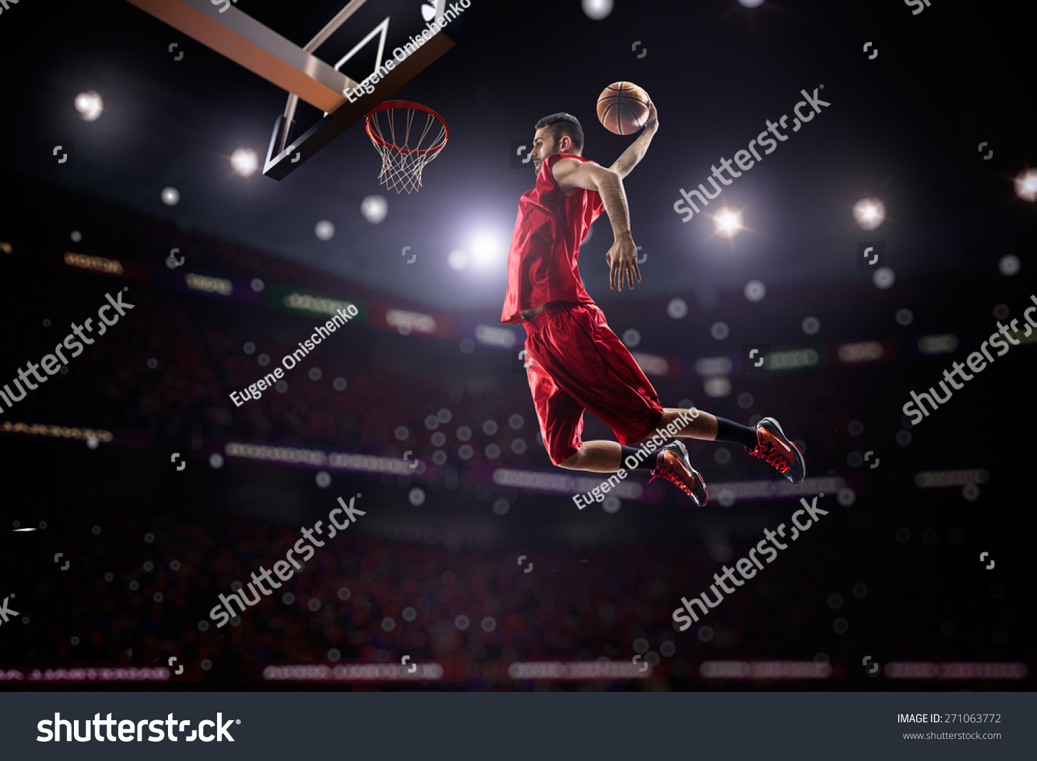 red Basketball player in action in gym #271063772