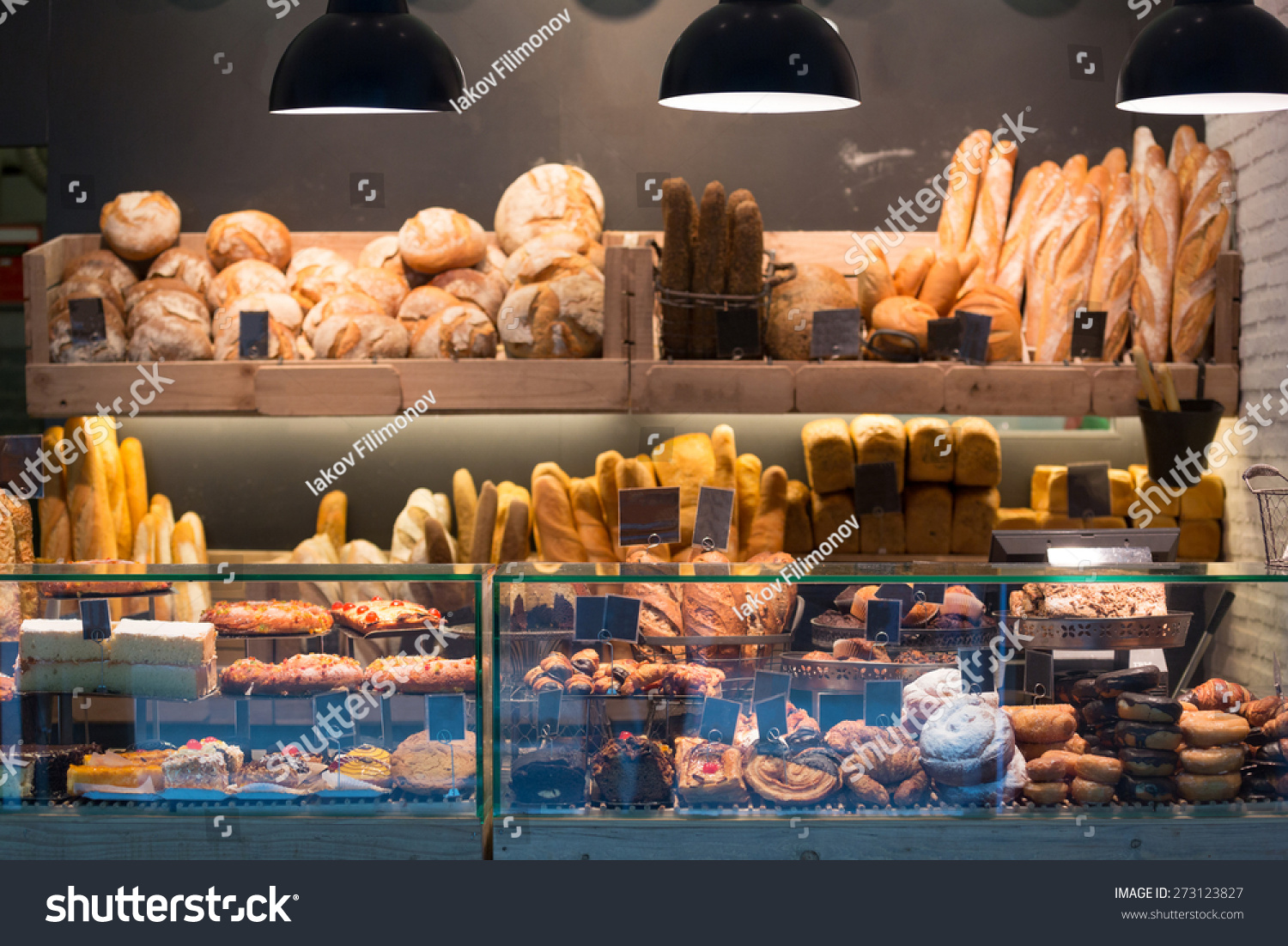 Modern bakery with different kinds of bread, cakes and buns   #273123827