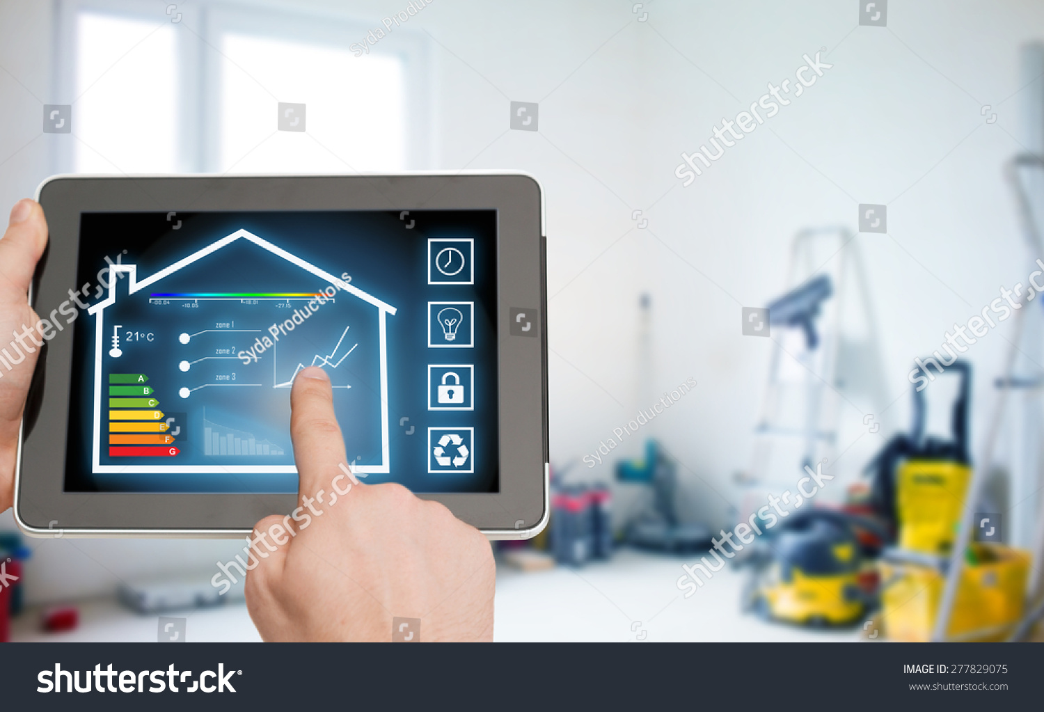 home, housing, people and technology concept - close up of man hands pointing finger to tablet pc computer and regulating room temperature over storeroom or building background #277829075