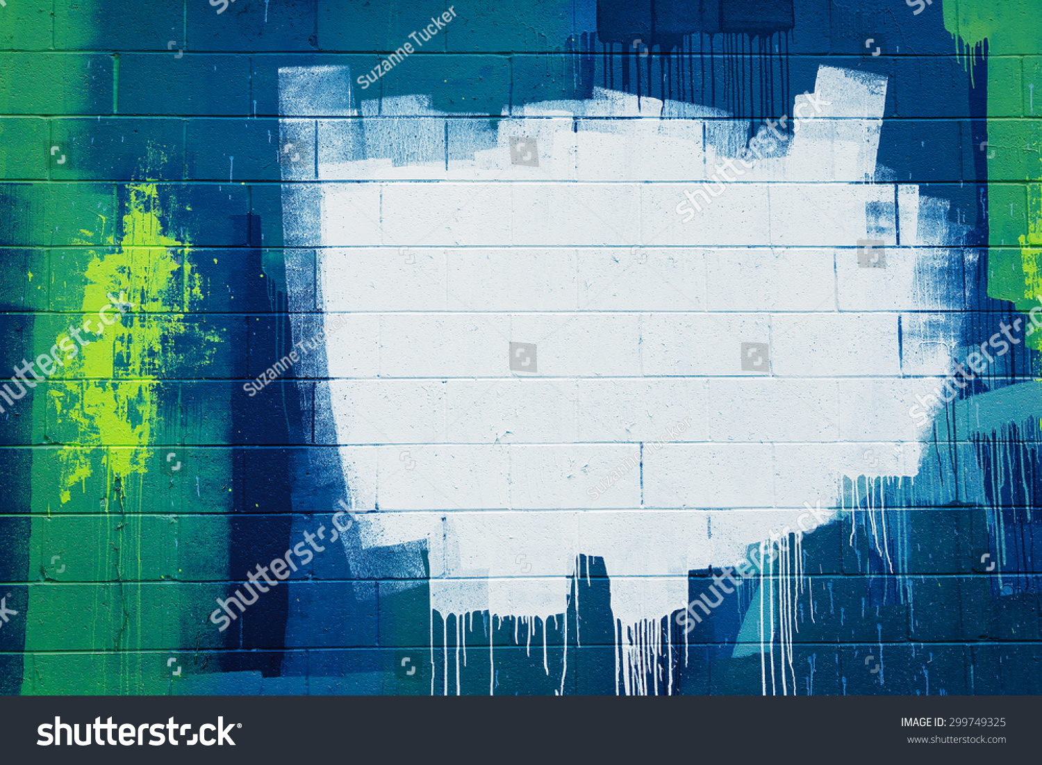 White paint stroke copyspace on a cement block wall. Urban Grunge #299749325