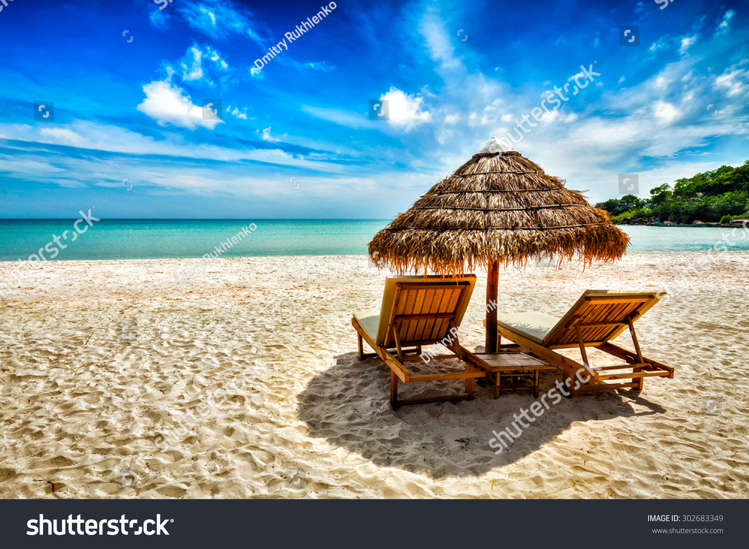 Vacation holidays background wallpaper - two beach lounge chairs under tent on beach. Sihanoukville, Cambodia #302683349