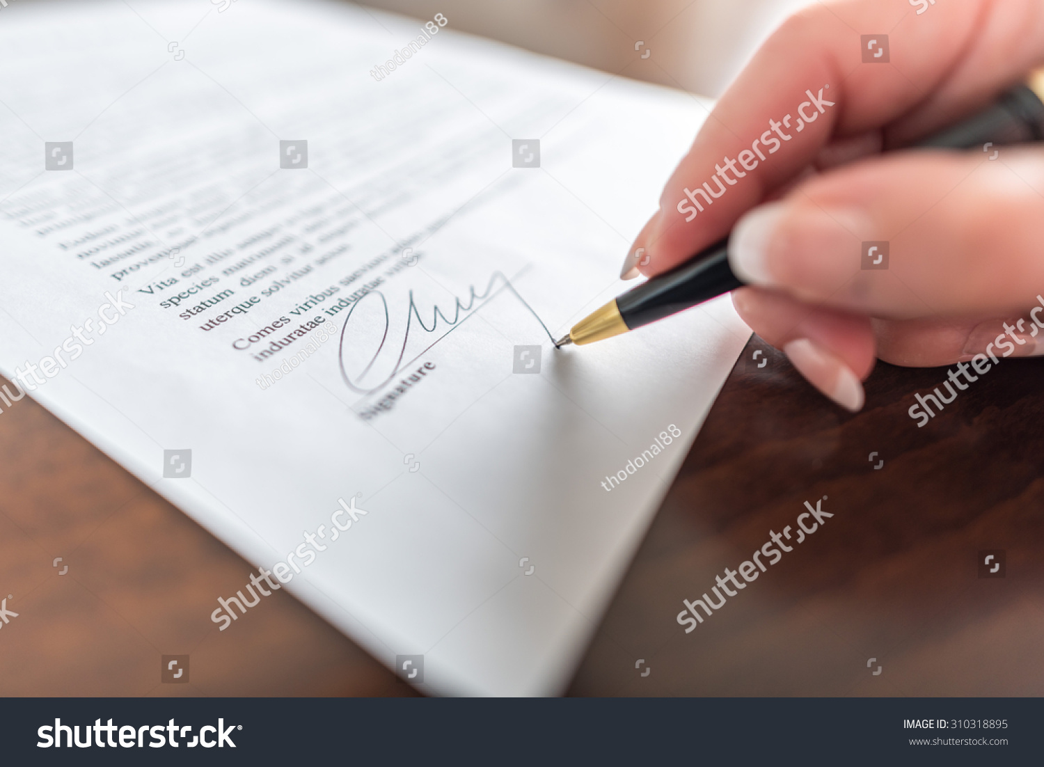 Woman hand signing a contract #310318895