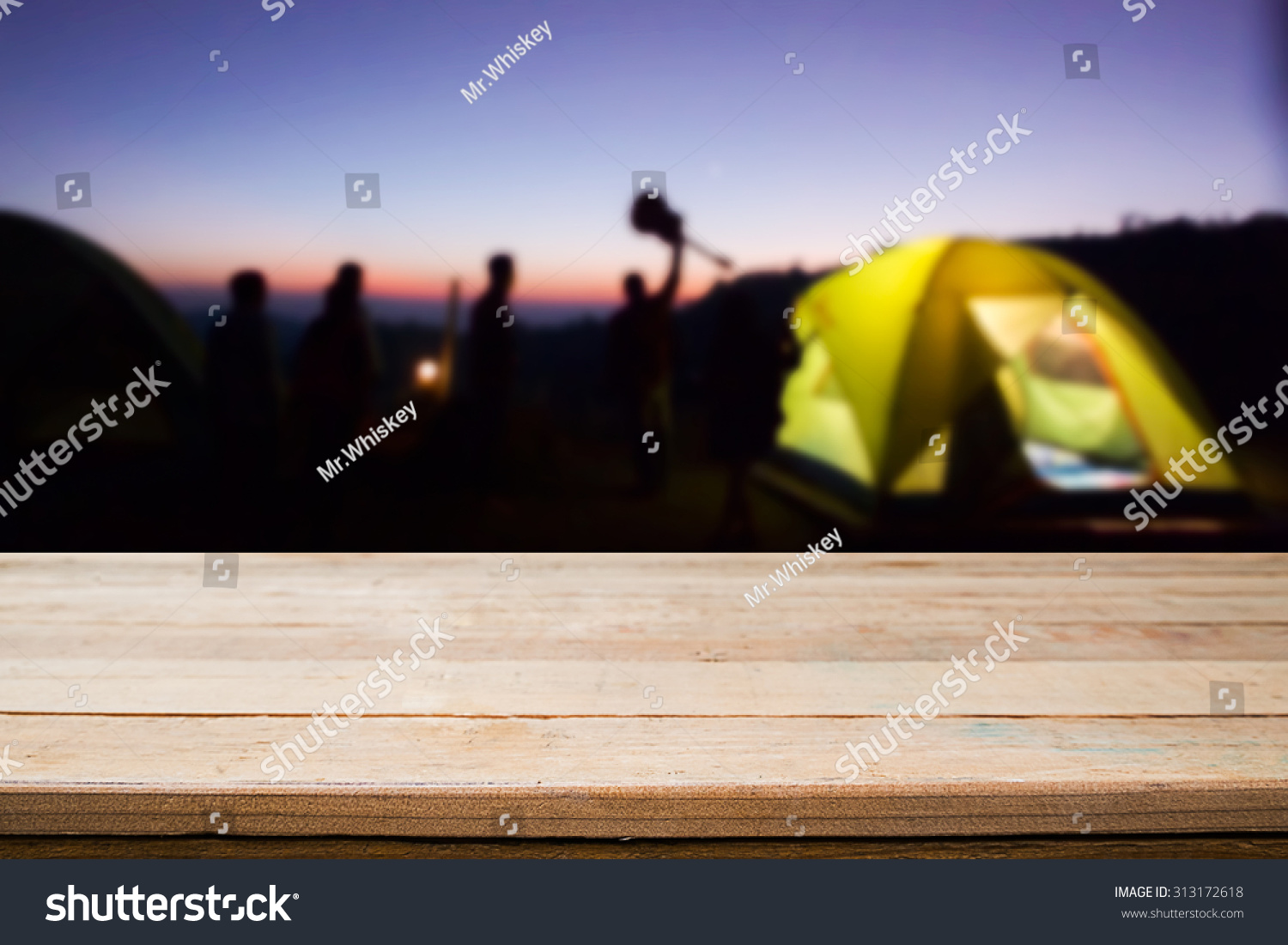wood desk and night camping background. #313172618