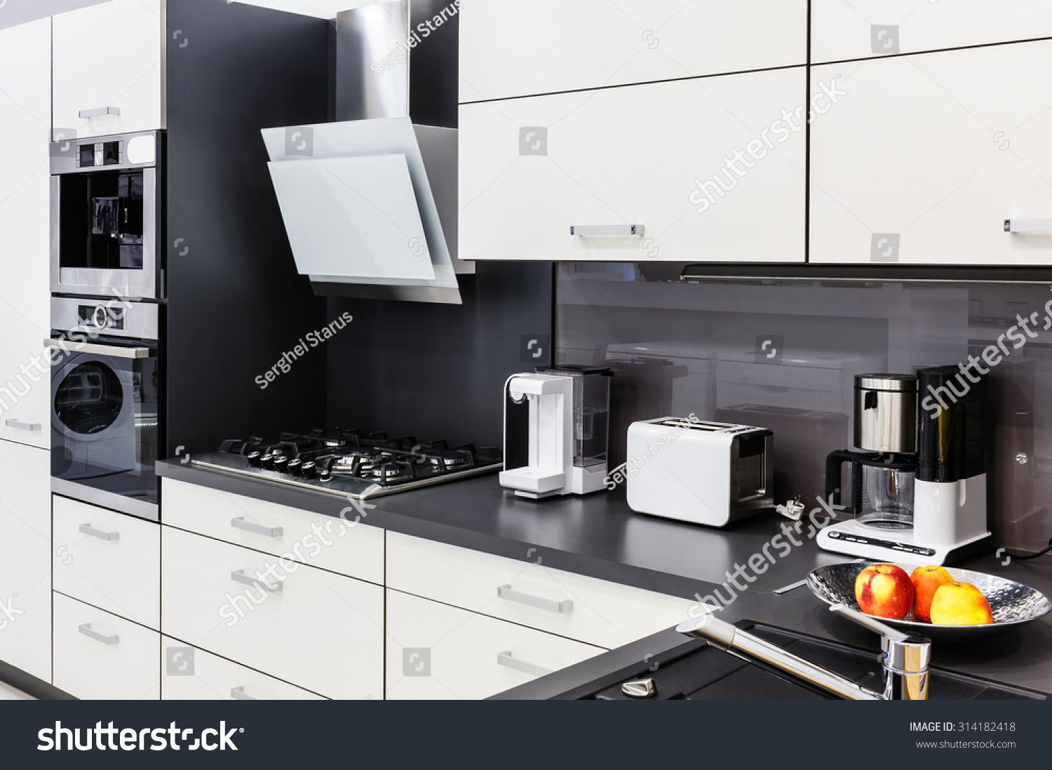 Modern luxury hi-tek black and white kitchen interior, clean design #314182418