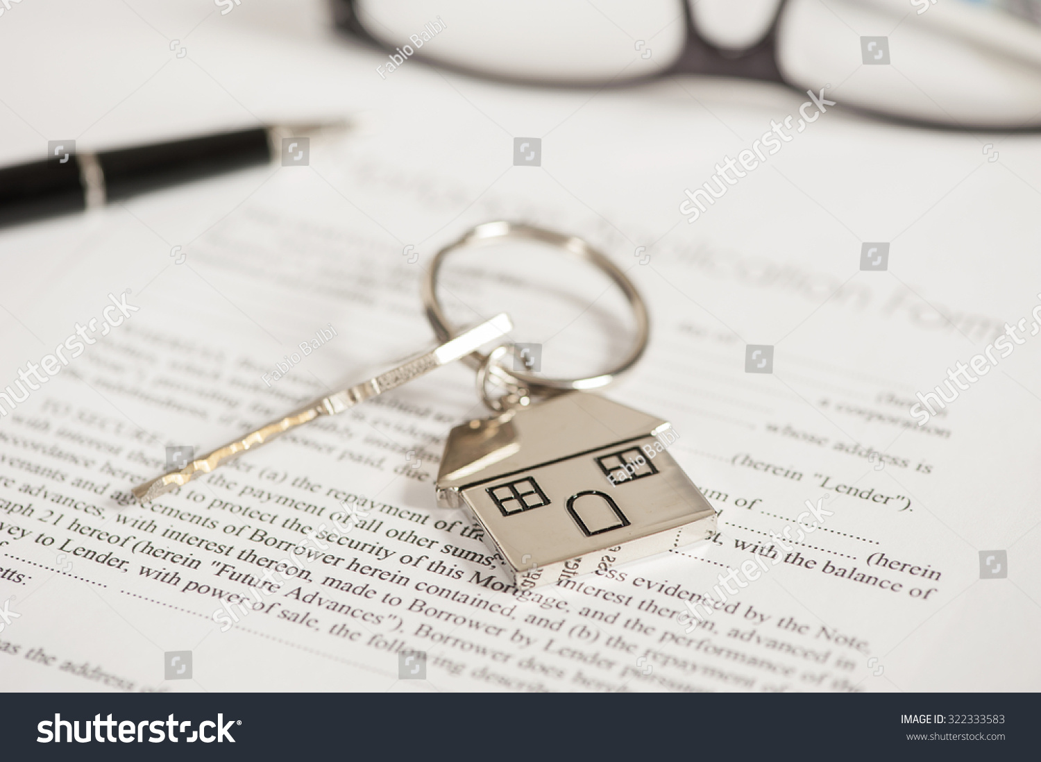 Mortgage loan agreement application with house shaped keyring #322333583