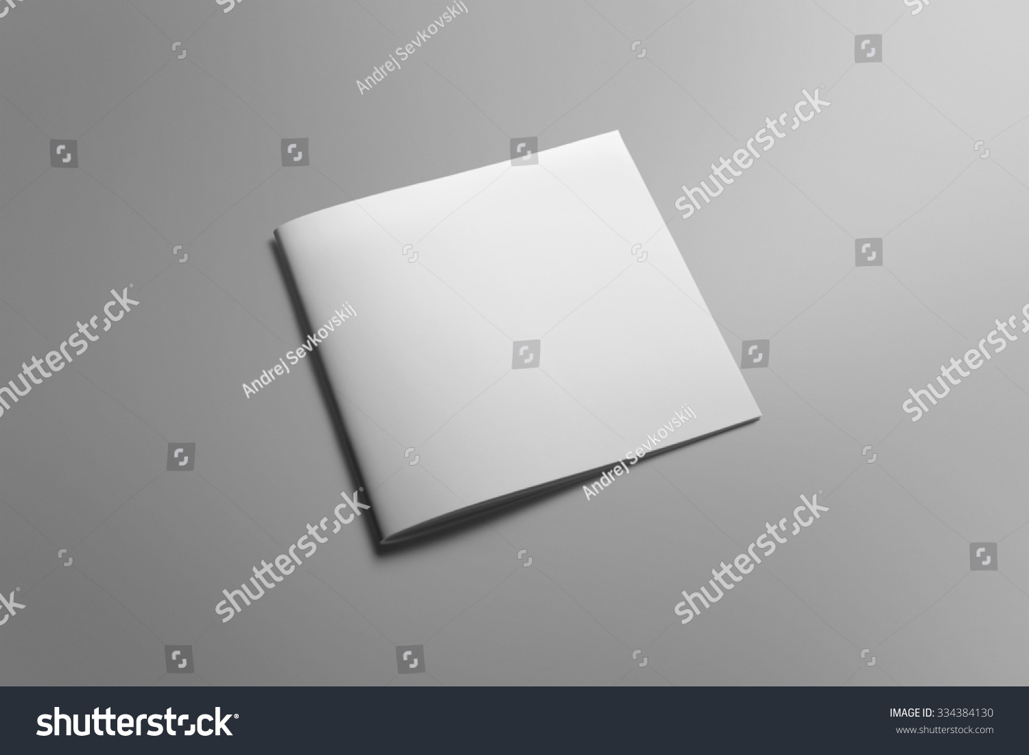 Blank square brochure magazine isolated on grey, with clipping path, changeable background #334384130