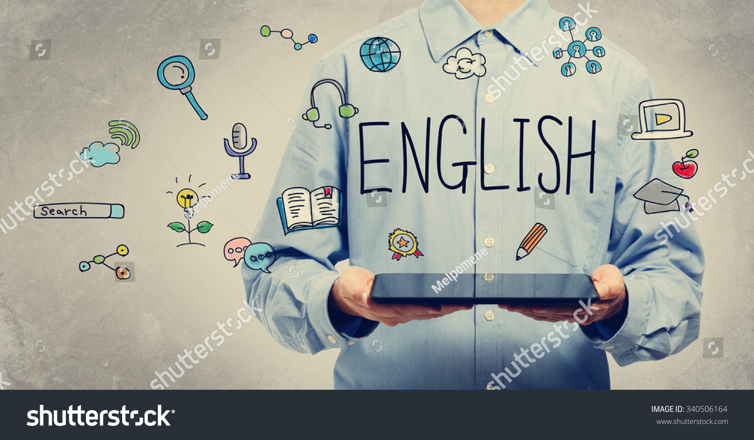 English concept with young man holding a tablet computer  #340506164