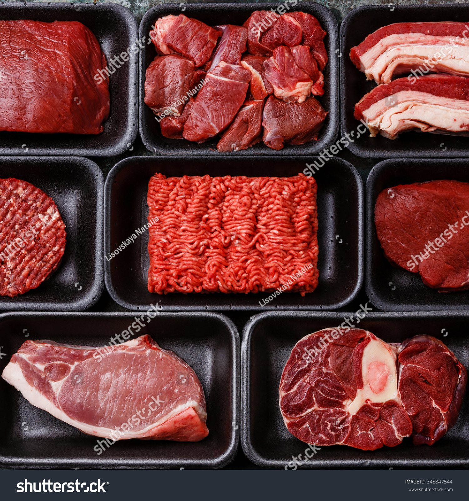 Different types of meat in plastic boxes packaging tray #348847544