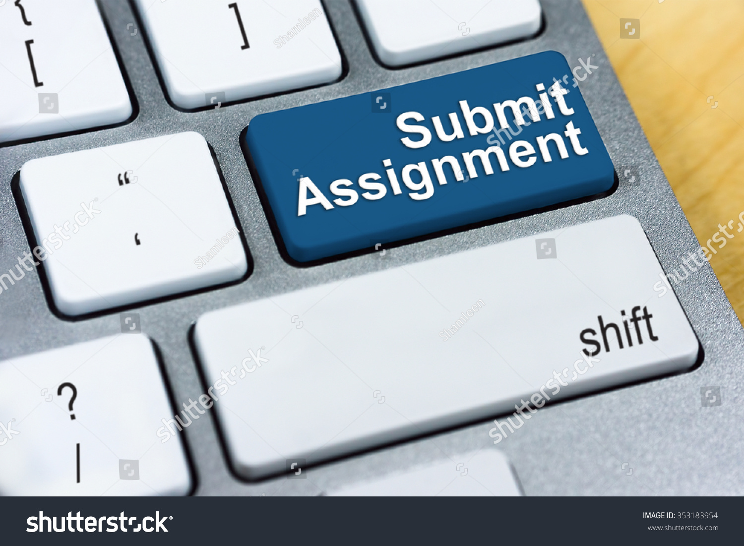 Education concept: Written word Submit Assignment on blue keyboard button. #353183954