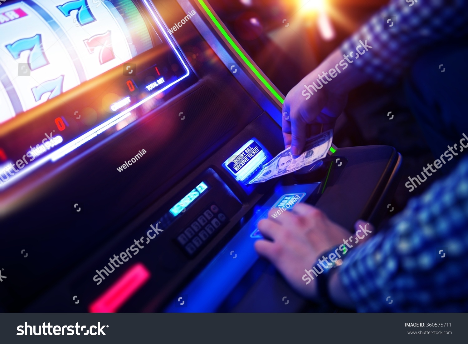 Las Vegas Slot Gambling Addiction. Men Playing Traditional Slot Machine. #360575711