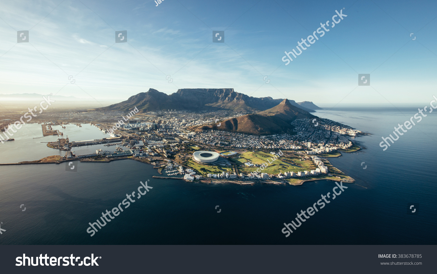 Aerial coastal view of Cape Town. View of cape town city with table mountain, cape town harbour, lion's head and devil's peak, South Africa. #383678785