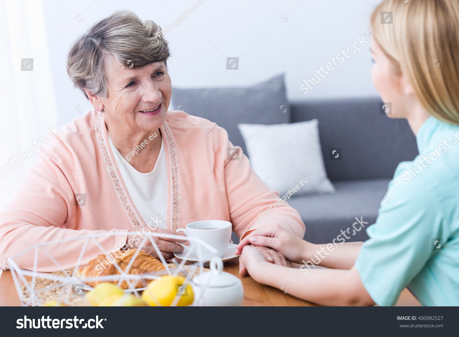 Picture of positive senior with health afflictions and carer #400982527