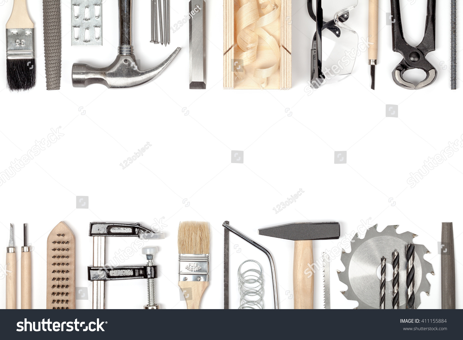 carpentry and woodwork tools on white background. carpenter working table. frame composition with copy space top view #411155884