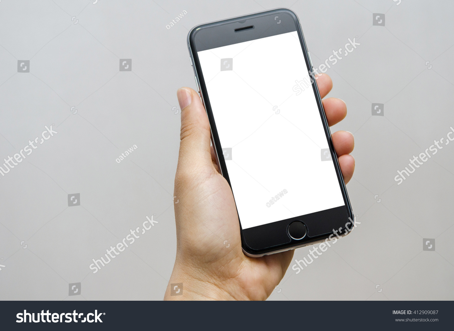 Close up hand holding black phone on white clipping path inside. #412909087