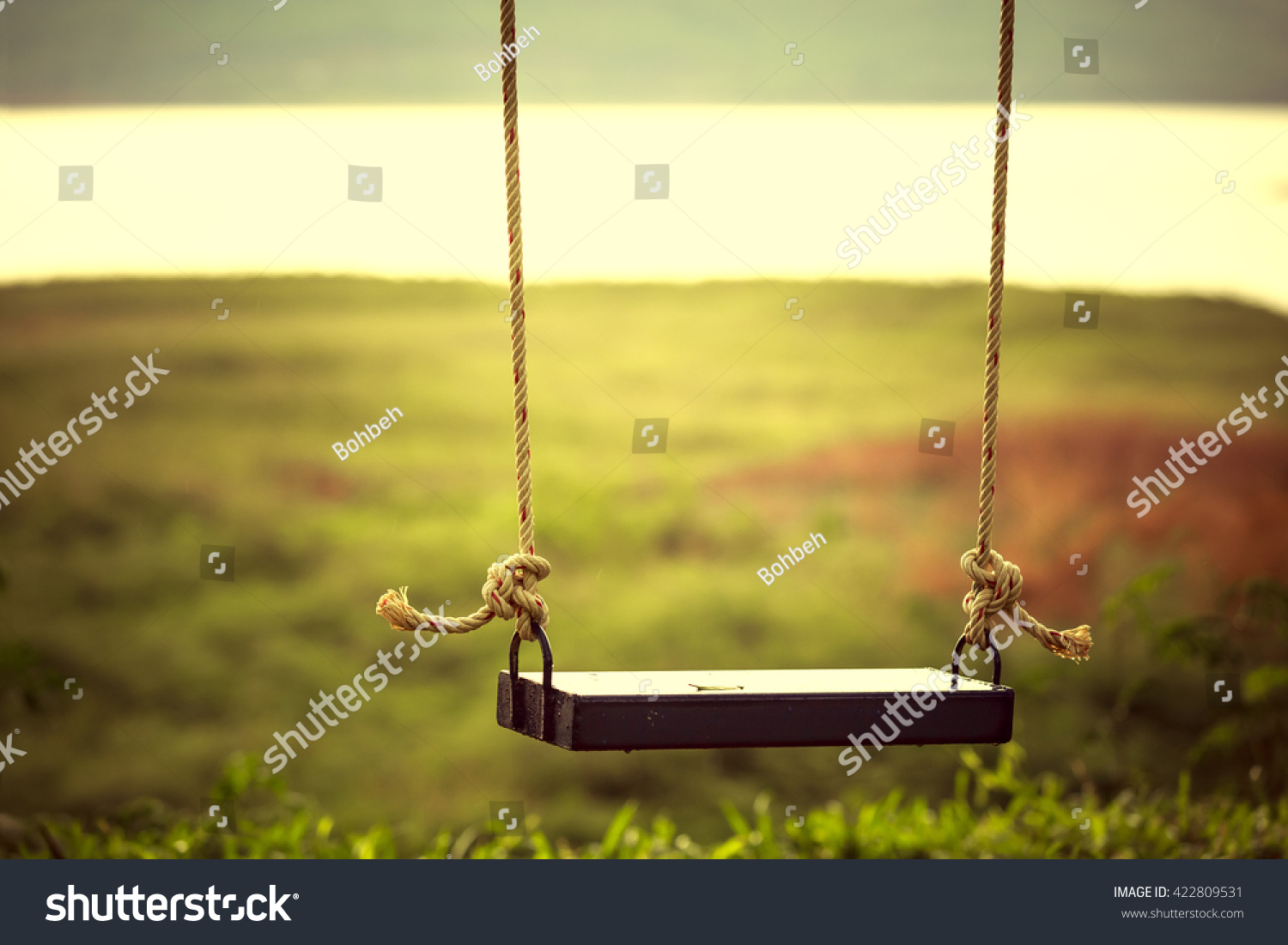 Children swing in the park (vintage tone) #422809531