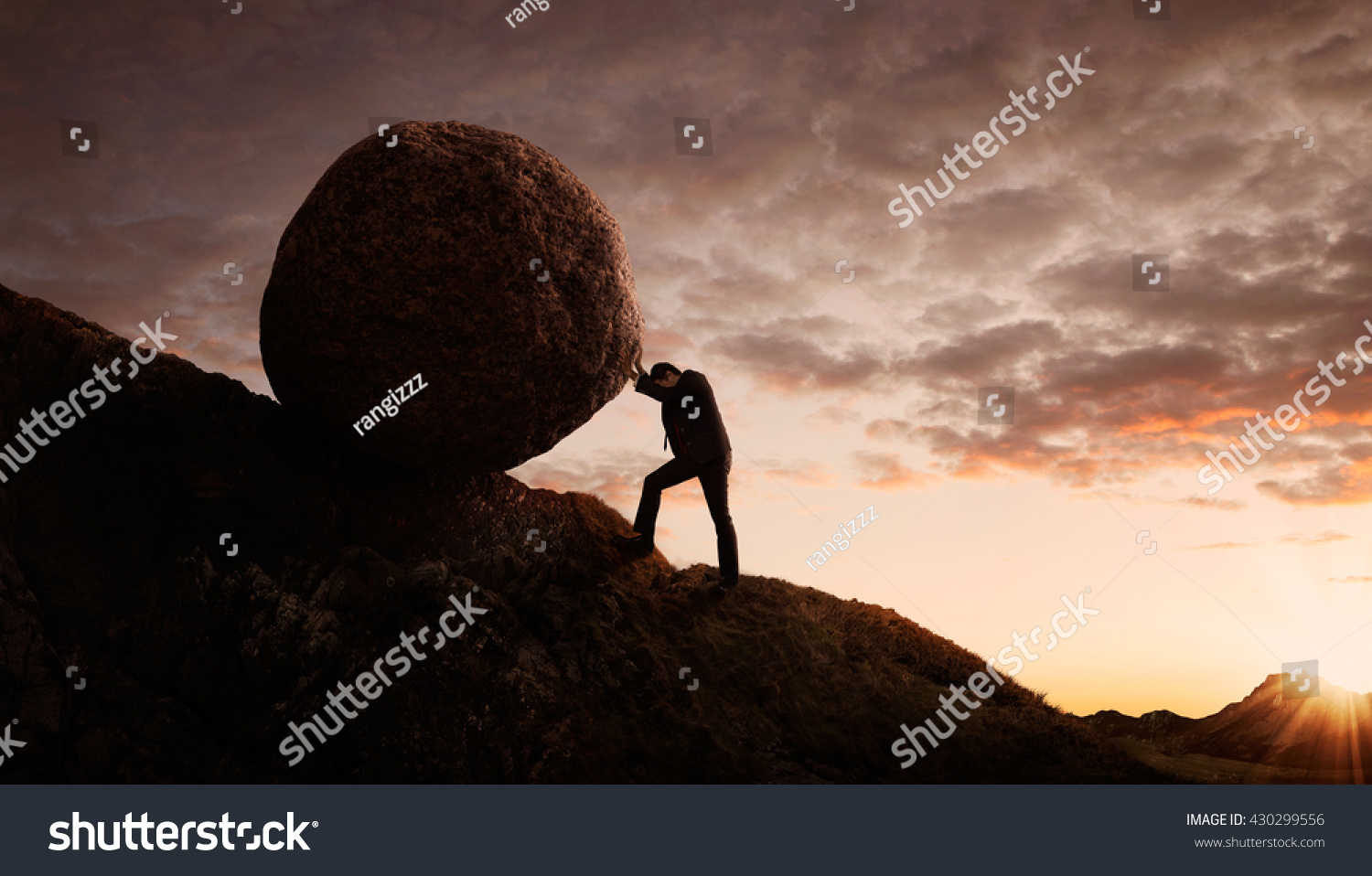 Business concept, Young businessman pushing large stone uphill with copy space #430299556