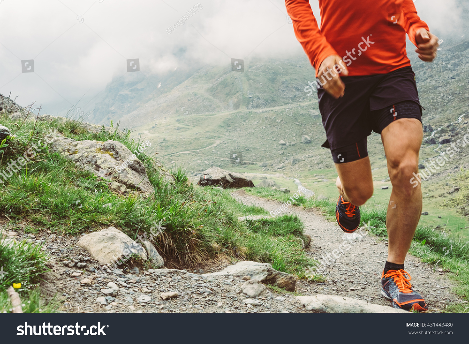 Man trail running in the mountain #431443480