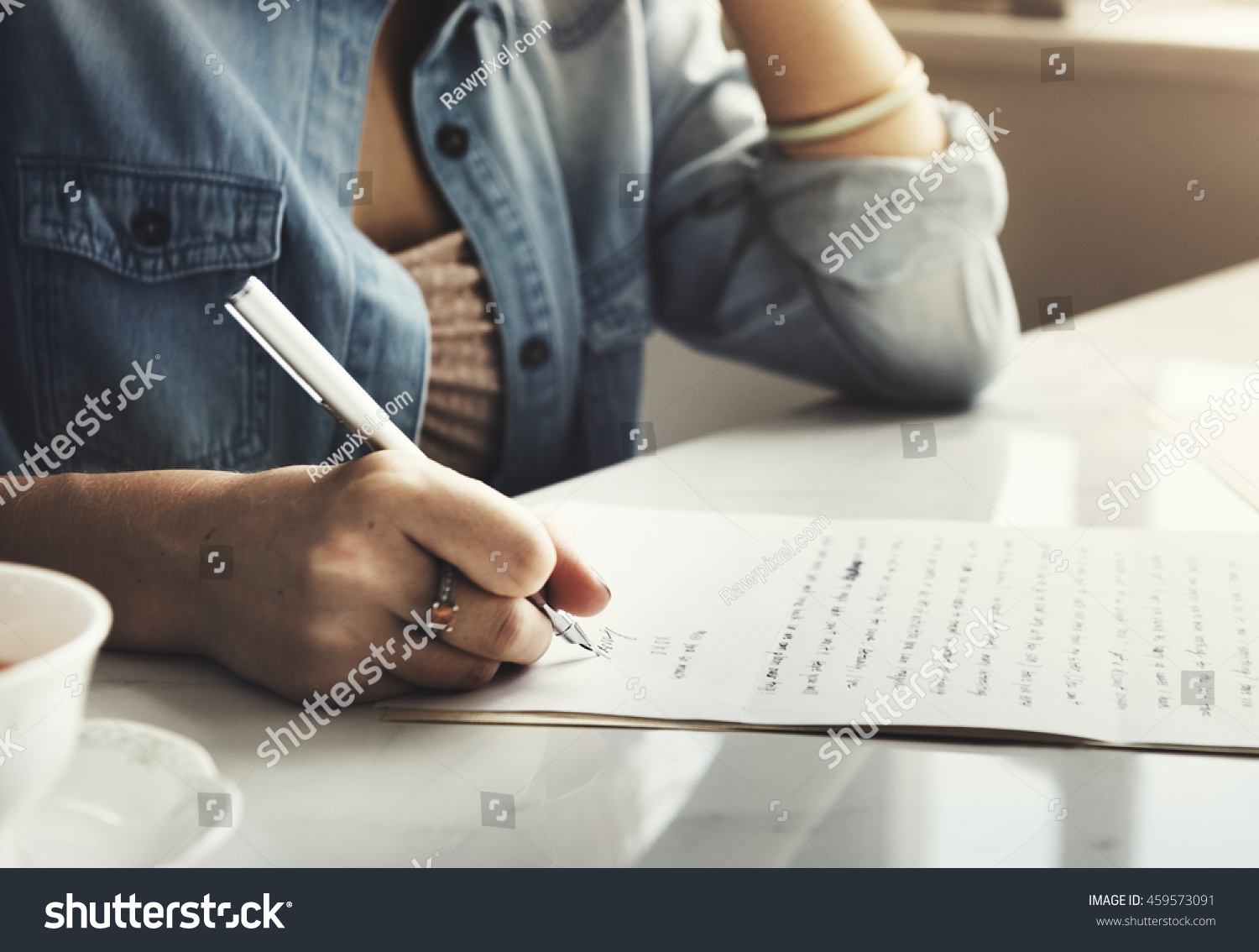 Girl Writing Letter Home Concept #459573091