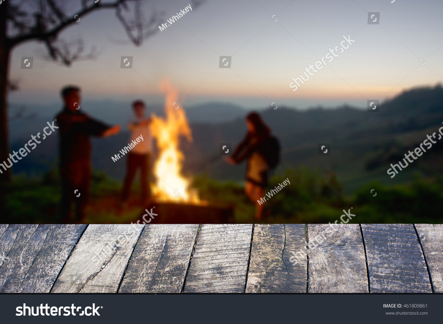 Dark wood desk space and night camping in forest background. #461809861